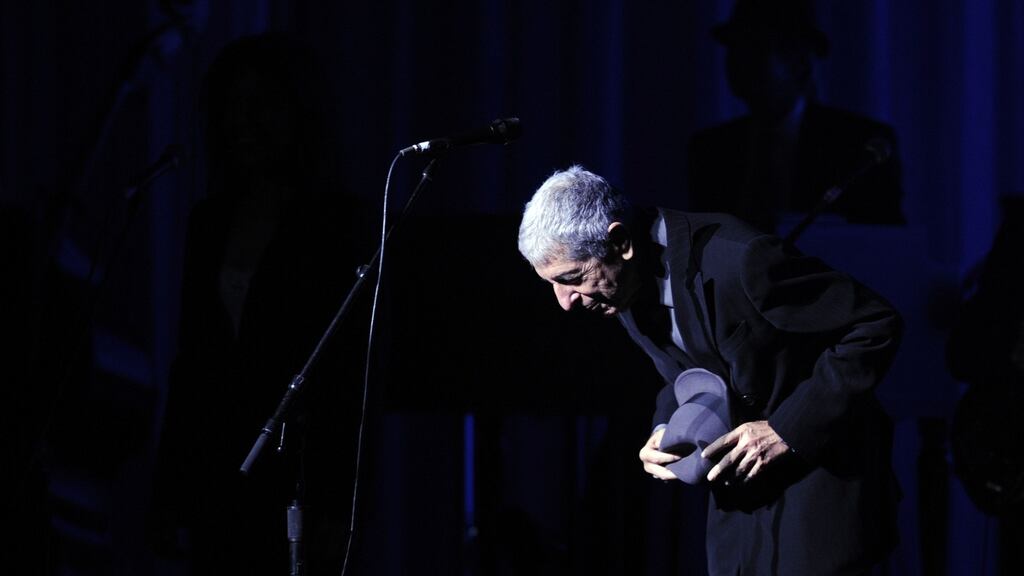 Leonard Cohen takes a bow on stage in  Toronto in 2008. Photograph:  Aaron Harris/AP Photo/The Canadian Press