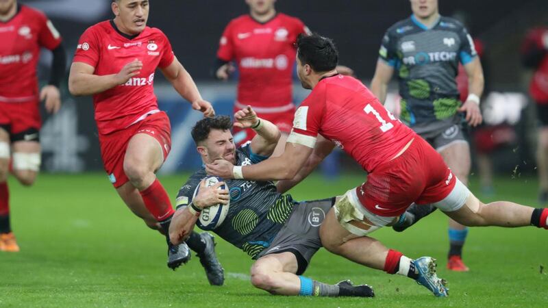 Luke Morgan is tackled by Sean Maitland during the Ospreys’ defeat to Saracens. Photograph: David Davies/PA