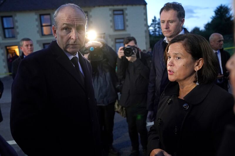 Taoiseach Micheal Martin speaks to Sinn Féin leader, Mary Lou McDonald, at the scene of an explosion at Applegreen service station in the village of Creeslough in Co Donegal, where 10 people have now been confirmed dead. Photograph: Brian Lawless/PA
