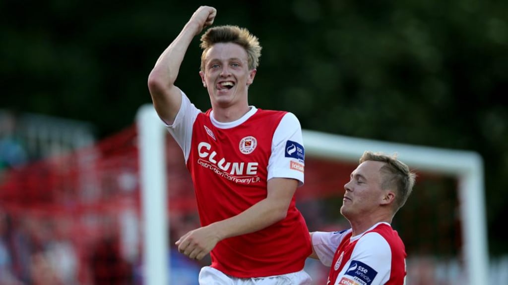 Chris Forrester of St Pat’s celebrates scoring his second goal of the game with Conor McCormack. Photograph: Donall Farmer/Inpho