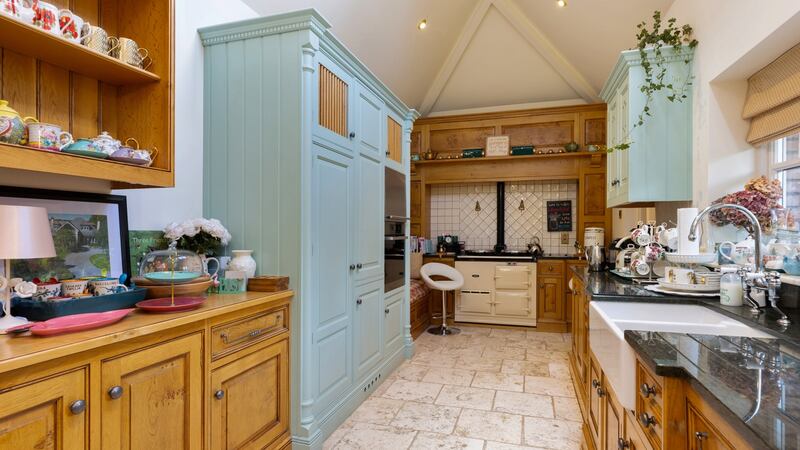 The kitchen at Mountain Lodge is fitted in rustic country style.
