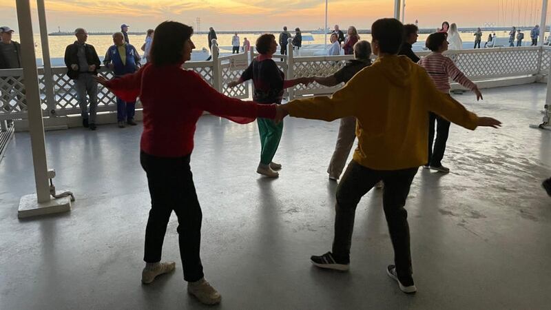 People dancing in Sochi, on Russia’s Black Sea coast. Photograph: Daniel McLaughlin