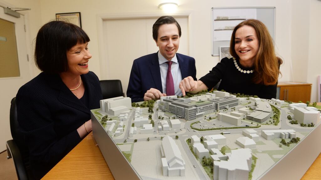 Minister for Health Simon Harris, St Vincent’s  chief operations officer Kay Connolly and Dr Rhona Mahony, master of the National Maternity Hospital, with the model of the Natonal Maternity Hospital at St Vincent’s. Photograph:  Cyril Byrne