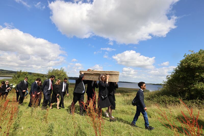 O’Brien's casket is carried to the burial plot on Holy Island. Photograph: Dara Mac Dónaill/The Irish Times
