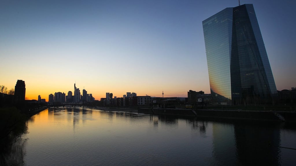The sun sets behind the European Central Bank and the city skyline in Frankfurt, Germany. Photograph: DANIEL ROLAND/AFP via Getty Images