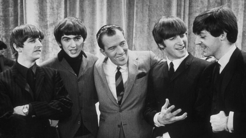 The Beatles with TV mega-host Ed Sullivan on February 9th, 1964, seen by some 73 million American viewers.