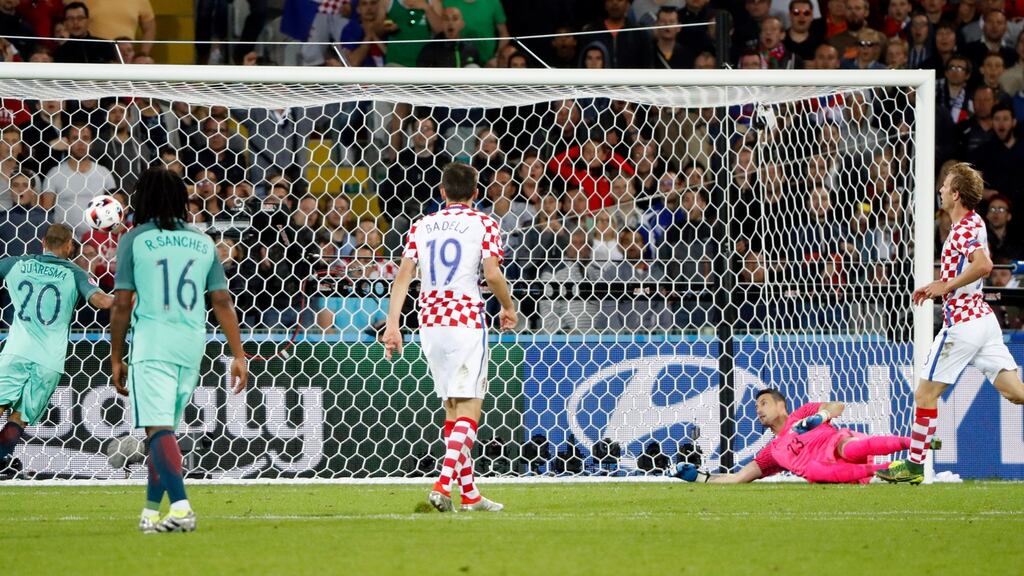 Portugal’s Ricardo Quaresma heads home his side’s late winner in extra time in the last 16 game against Croatia in  Lens. Photograph: Charles Platiau/ Reuters/Livepic