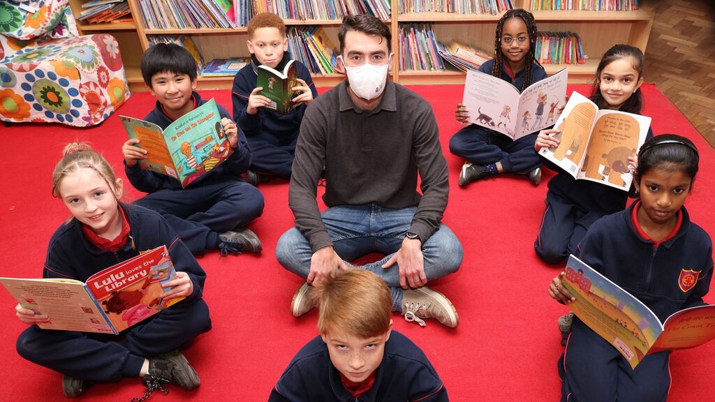 Phil McCarthy, a teacher at Mother of Divine Grace school, Ballygall, Dublin, with fourth class pupils, from left, Khloe, Shane, Aleksander, Nelly, Adhira, Roshnirashmita and Darragh, front centre. Photograph: Laura Hutton