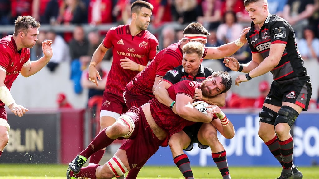 Munster’s Jean Kleyn is tackled by Edinburgh’s Jaco van der Walt during the semi-final qualifier at Thomond Park. Kleyn is an injury concern for the semi-final against Leinster. Photograph: Billy Stickland/Inpho