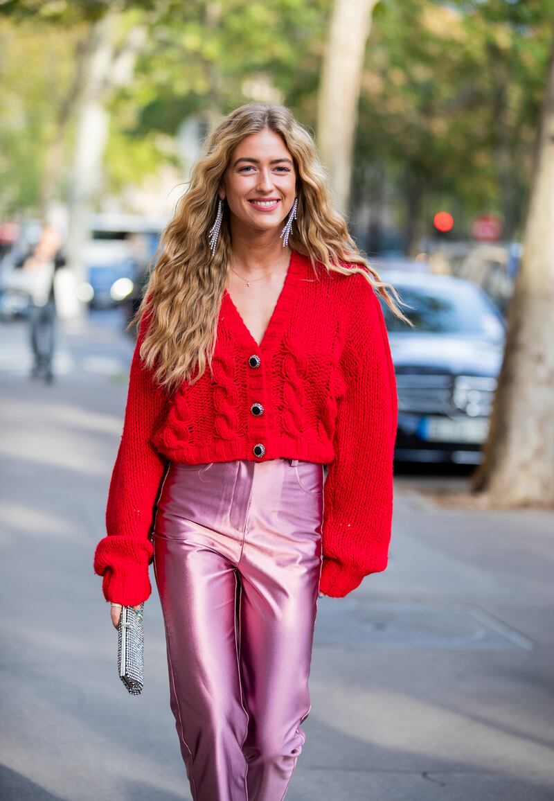 Cardigans: Emili Sindlev seen wearing a red cropped cardigan during Paris Fashion Week. Photograph: Christian Vierig/Getty