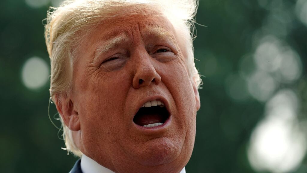 US president Donald Trump has defended his decision to strip the security clearance of former CIA director John Brennan. Photograph: Reuters