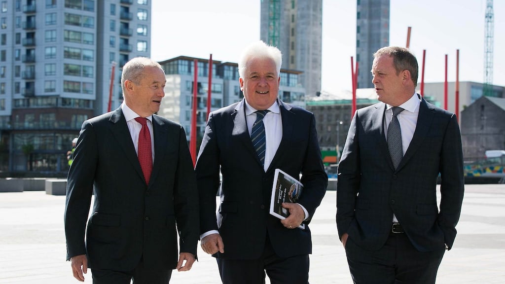Cairn Homes group finance director Tim Kenny, non-executive chairman John Reynolds and chief executive Michael Stanley. Photograph: Shane O’Neill