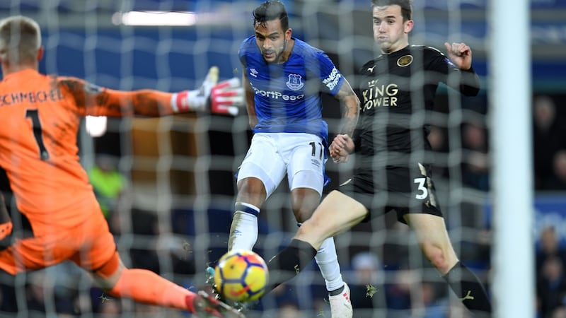 Theo Walcott scores his second goal in Everton’s Premier League game against Leicester City at Goodison Park. Photograph: Paul Ellis/AFP/Getty Images