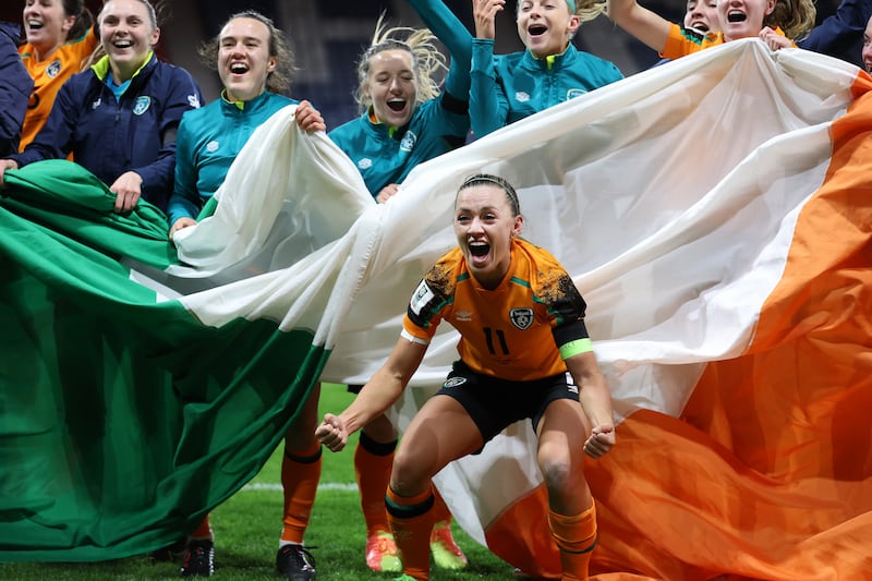 Katie McCabe of the Republic of Ireland celebrates with teammates after their side qualifies for the 2023 FIFA Women's World Cup after victory against Scotland. Photograph: Ian MacNicol/Getty Images