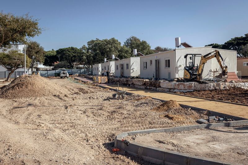 Temporary homes under construction in Shefayim, Israel, for families from Kfar Aza in December. Photograph: Avishag Shar-Yashuv/New York Times