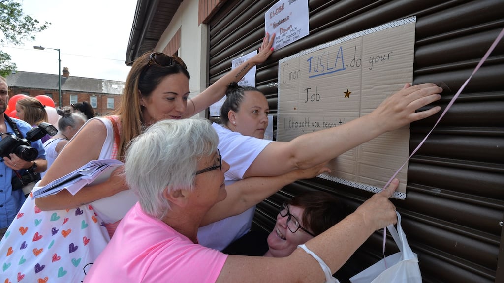Protesters including Sorcha Finnegan (left) and Patricia Griffin (wearing pink top) outside the Hyde & Seek child care facility in Drumcondra on Friday. Photograph: Alan Betson