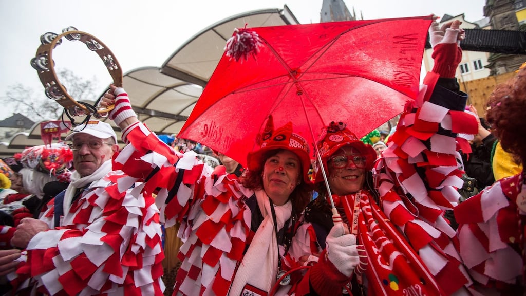 People in costume celebrate carnival in Cologne on Thursday. The city is spending close to €500,000 on police, paramedics and new equipment after the sexual assults suffered by women on New Year’s Eve. Photograph: Maja Hitij/EPA
