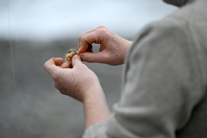 Mark Moriarty baits his rod