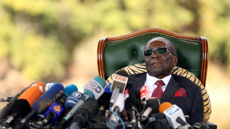 Zimbabwe’s former president Robert Mugabe attends a press conference at his private residence in Harare. Photograph: Siphiwe Sibeko/Reuters