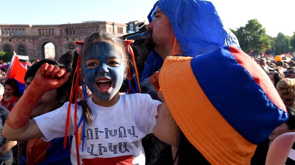 Supporters of Armenian protest leader Nikol Pashinyan attend a rally in downtown Yerevan on Tuesday. Photograph: Vano Shlamov/AFP/Getty Images