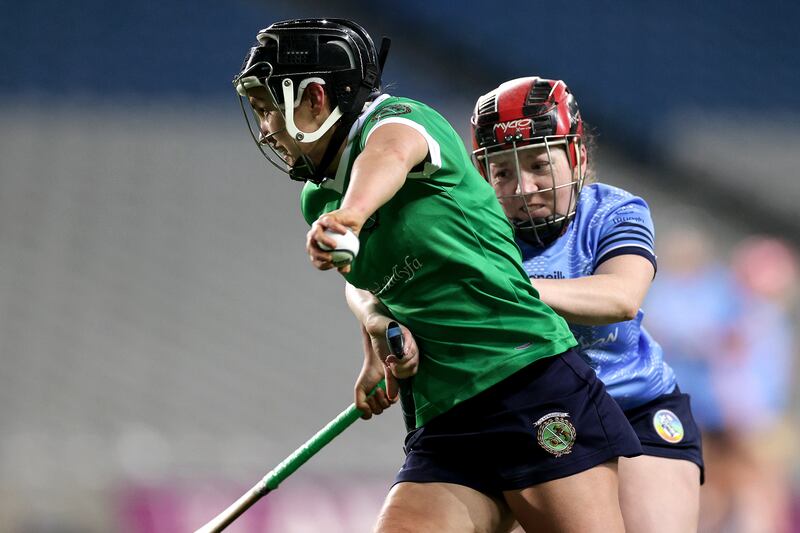 Sarsfields' Siobhán McGrath and Michelle Powell of Truagh-Clonlara in action during the All-Ireland camogie club final at Croke Park. Photograph: Laszlo Geczo/Inpho