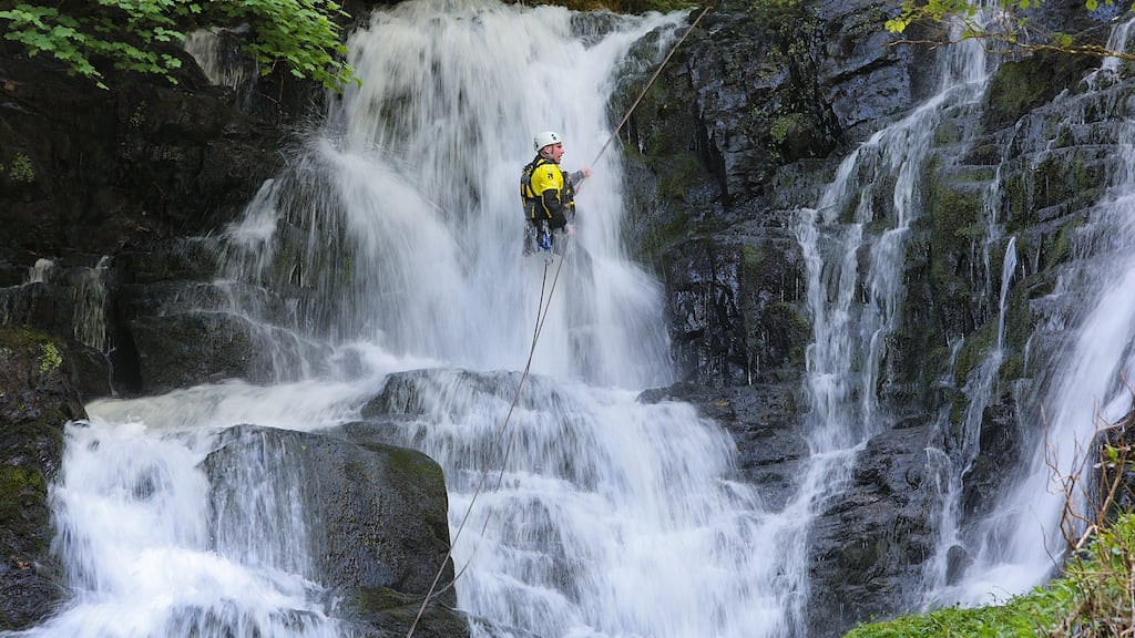 Nathan Kingerlee of Outdoors Ireland, canyoning at Torc Waterfall in Killarney. Photograph: Valerie O’Sullivan