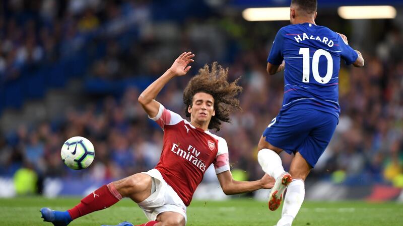 Chelsea’s Eden Hazard is challenged by Matteo Guendouzi of Arsenal during the Premier League game at Stamford Bridge. Photograph: Mike Hewitt/Getty Images