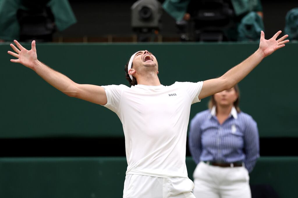 Taylor Fritz of United States celebrates match point against Alexander Zverev of Germany. Photograph: Clive Brunskill/Getty