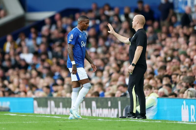 Sean Dyche, manager of Everton, gestures towards Ashley Young of Everton after he receives a red card. Photograph: Carl Recine/Getty