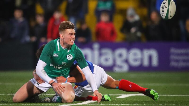 Ireland’s Jake Flannery is tackled by Arthur Vincent of France in Friday night’s Under-20 Six Nations Championship Round 4 at Irish Independent Park in Cork. Photograph: Oisin Keniry/Inpho