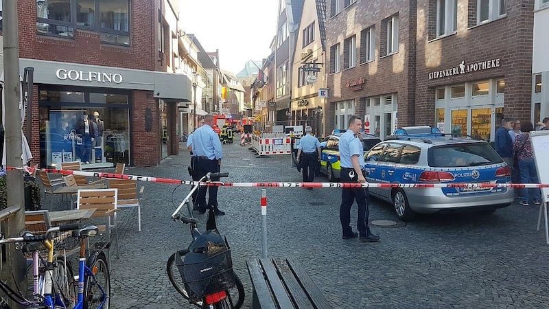 Policemen stand at a barricade to the inner city of Muenster on Saturday where a man drove into a crowd and then killed himself. Photograph: EPA