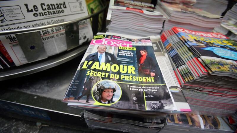 Copies of French magazine Closer, with photos of French president François Hollande and French actor Julie Gayet on its cover, at a newspaper stall on the Champs-Élysées in Paris yesterday. Photograph: AP Photo/Remy de la Mauviniere
