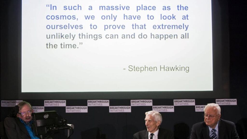 Prof Stephen Hawking speaks at a media event to launch a global science initiative as cosmologist Martin Rees and astronomer Frank Drake look on at the Royal Society in London. File photograph: Neil Hall/Reuters