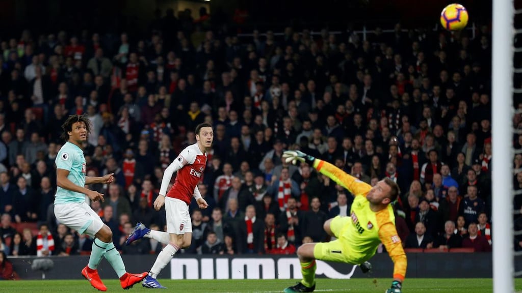 Mesut Özil opens the scoring for Arsenal in the Premier League game against Bournemouth at the Emirates stadium. Photograph: Ian Kington/AFP/Getty Images