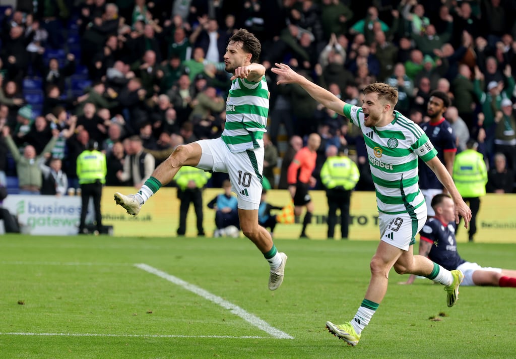 Nicolas Kuhn celebrates scoring to put Celtic ahead against Ross County at the Global Energy Stadium in Dingwall. Photograph: Steve Welsh/PA