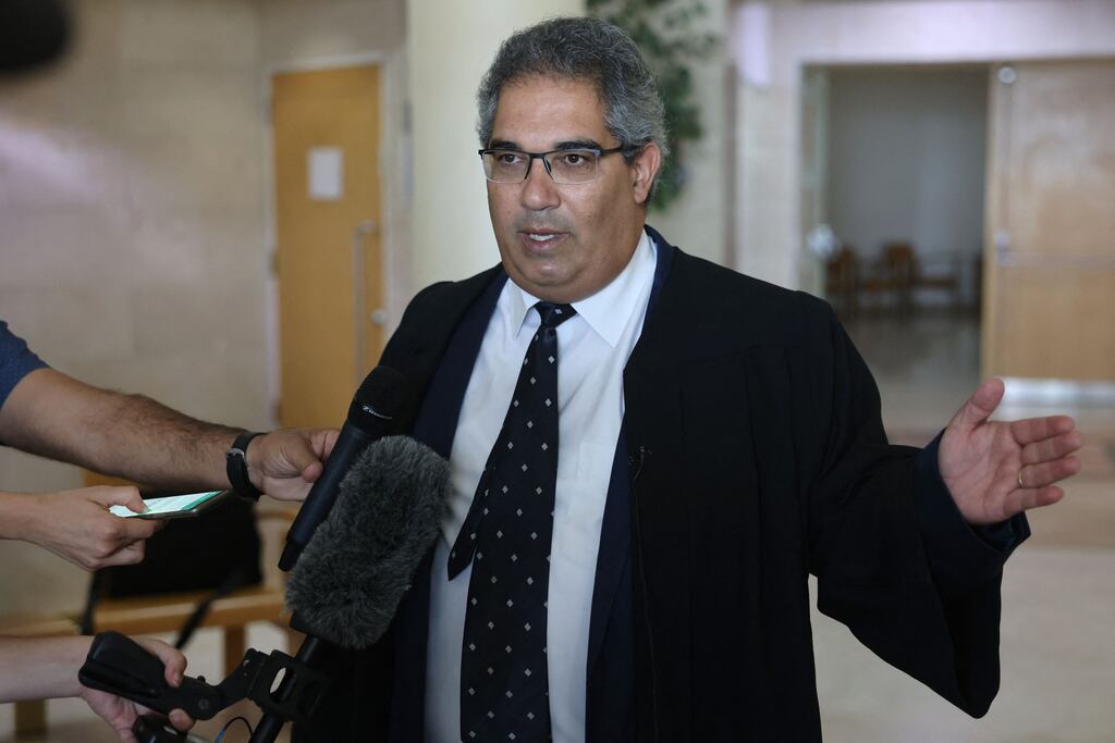 Mohammed al-Halabi's lawyer Maher Hanna speaks outside the Beersheba district court after his client, the head of Gaza operations for World Vision, was sentenced to 12 years in prison. Photograph: Ahmad Gharabli/ABLI/AFP via Getty Images