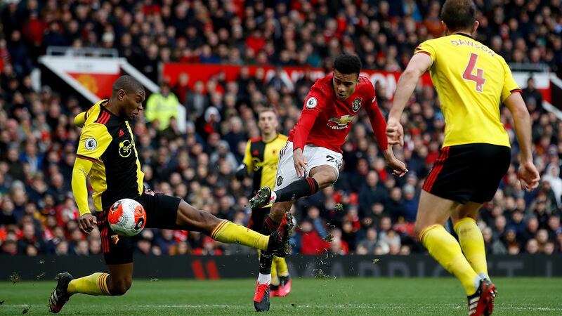 Mason Greenwood scores Manchester United’s third goal during the Premier League match against Watford at Old Trafford. Photograph: Martin Rickett/PA Wire