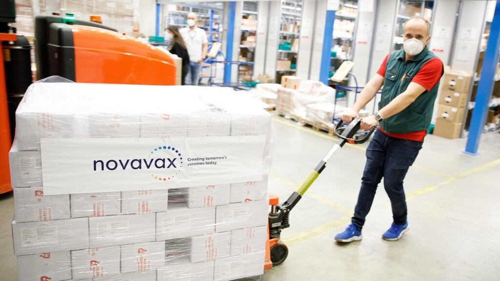 A man pulls a pallet with the Nuvaxovid vaccine made by US company Novavax after a shipment arrived at a warehouse in Hagenbrunn, lower Austria. Photograph: FLORIAN WEISER/ Getty Images