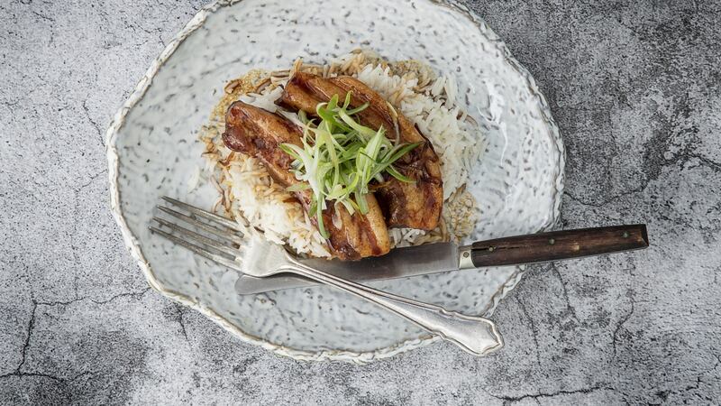 Melting pork belly with ginger, spring onions. Photograph: Harry Weir Photography