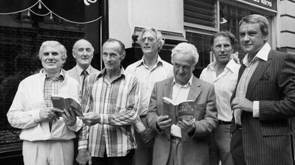 A 1979 file photograph of the seven men involved in the Great Train Robbery of 1963. Bruce Reynolds (centre) has died aged 81. Photograph: PA.