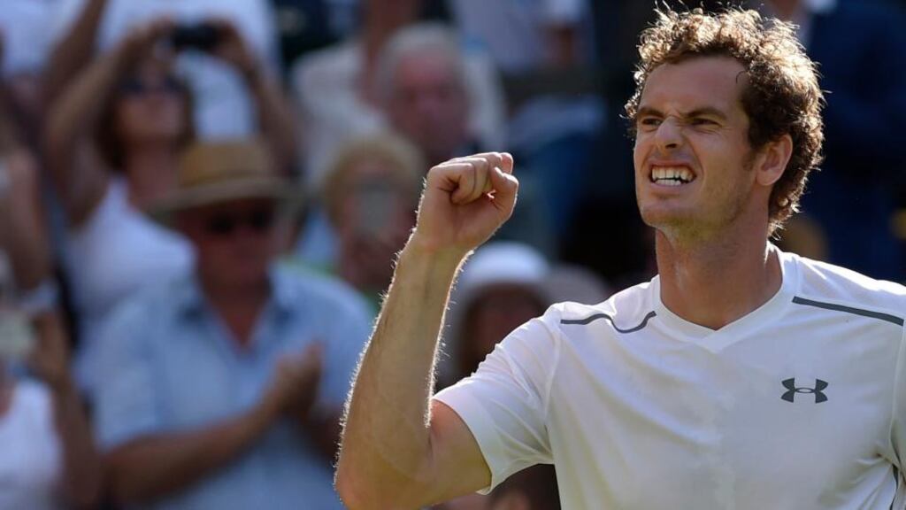 Scotland’s Andy Murray celebrates after winning his match against Ivo Karlovic of Croatia at the Wimbledon Tennis Championships in London yesterday. Photograph: Toby Melville/Reuters