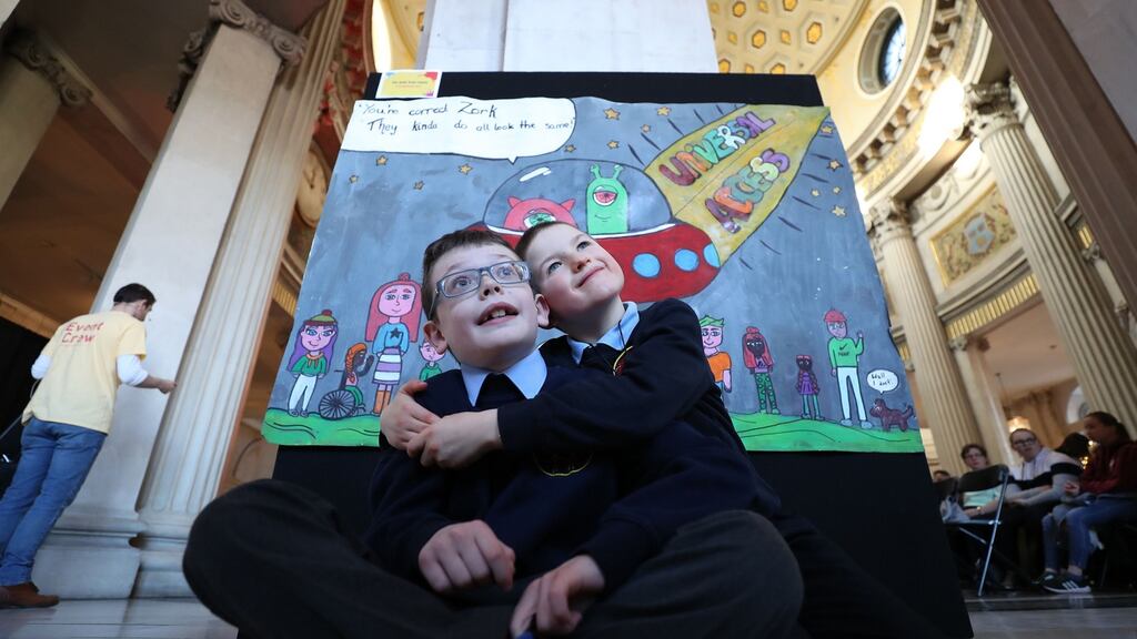 Ethan O’Brien and Luke McLoughlin at the results of an art competition for the International Day of People with Disabilities. Photograph Nick Bradshaw