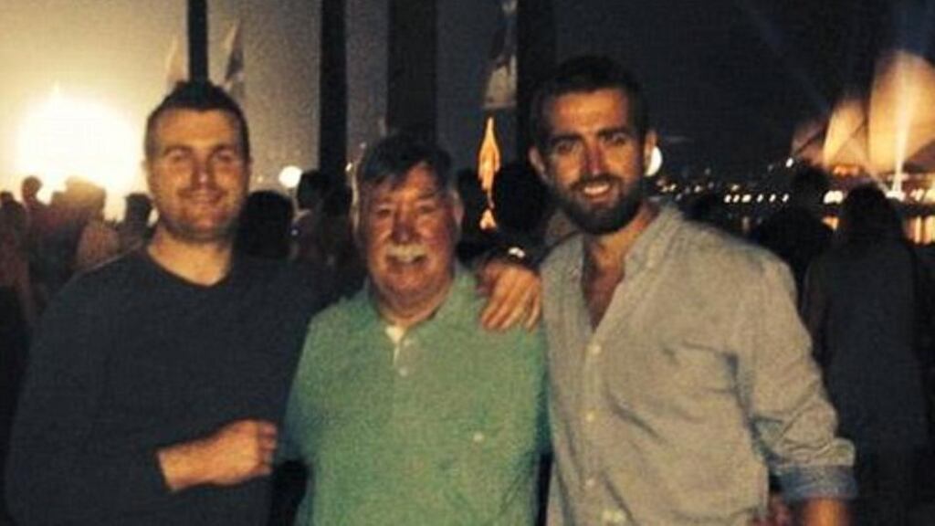 From left, Barry Lyttle (33), Oliver Lyttle (74) and Patrick Lyttle (31) seen in a photograph celebrating New Year’s Eve in Sydney. Patrick Lyttle has emerged from a coma after spending three days unconscious after incident in Sydney. Image: Facebook