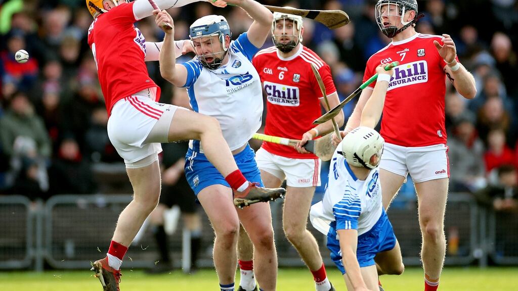 Waterford’s Stephen Bennett and Jack Fagan with Niall O’Leary, Tim O’Mahony and Damien Cahalane of Cork. Photograph: James Crombie/Inpho