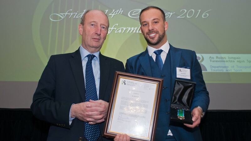 Davitt Walsh receiving the Michael Heffernan gold medal for bravery from the Minister for Transport Shane Ross at the National Marine Gallantry and Meritorious Service Awards, which took place at Farmleigh, Dublin. Photograph: Dave Meehan/The Irish Times
