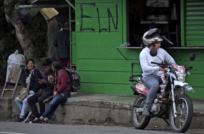 Graffiti supporting the ELN guerrilla group  in Caloto, Colombia, in May 2022. Photograph: Raul Arboleda /AFP via Getty Images