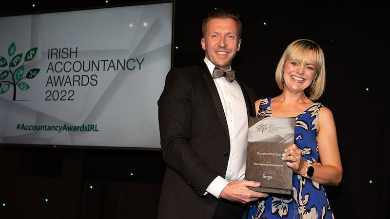 Grant Picknell, VP of Accountants, Sage, presents the Practice of the Year award to Fiona Hickey, FAH Chartered Accountants.