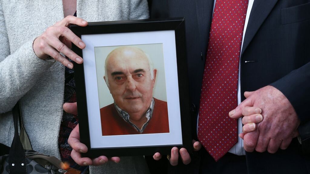 The family of the late Anthony O’Mahony,hold his picture outside the Central Criminal Court in Dublin after Michael Ferris was sentenced to five years. Photograph: Laura Hutton/Collins.