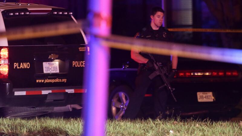 A police officer at the scene of the shooting in Texas on Sunday. Photograph: AP