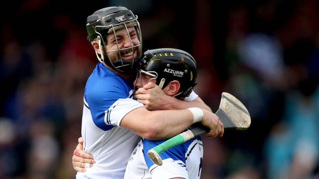 Waterford’s Noel Connors and Kevin Moran celebrates at the final whistle of the league final. Photo: James Crombie/Inpho
